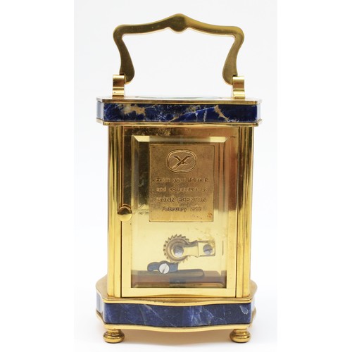 340 - Asprey, a lapis lazuli and brass carriage timepiece, with white enamel dial and shaped case, movemen... 