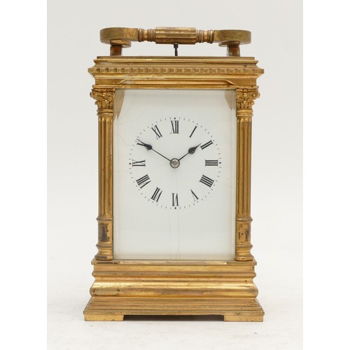 344 - A French 19th century brass repeating and striking carriage clock, white enamel dial, the movement s... 