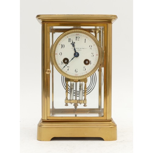 354 - Black, Starr & Frost, New York, a late 19th century American four glass brass mantel clock, white en... 