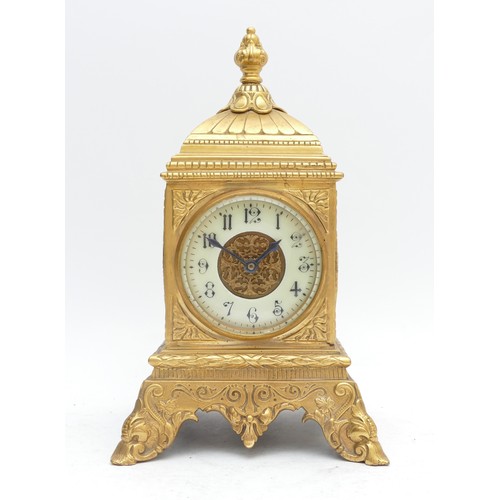 355 - A late 19th century French cast gilt brass mantel clock, with pierced side panels, 29cm.
Not working... 