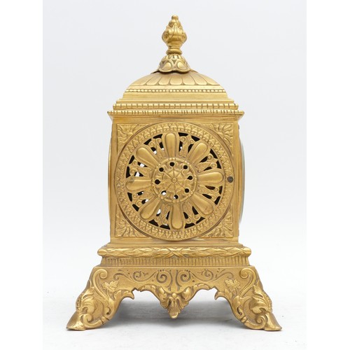 355 - A late 19th century French cast gilt brass mantel clock, with pierced side panels, 29cm.
Not working... 