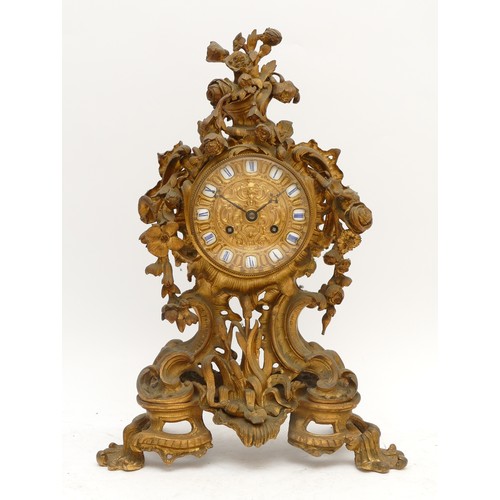 356 - Lepine, Paris, a French 19th century ormolu ornate floral mantel clock, the signed dial with blue Ro... 