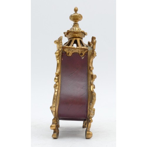 359 - A French 20th century gilt metal and burgundy leather time piece, with ornate mounts, the case numbe... 