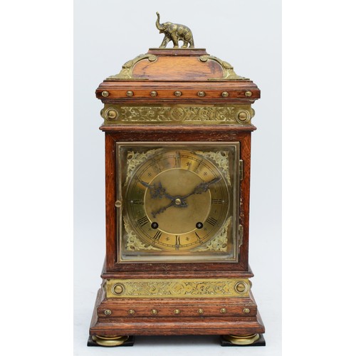 362 - Winterhalder and Hofmeier, a Victorian oak and brass mounted mantel clock, the chapter ring with Rom... 