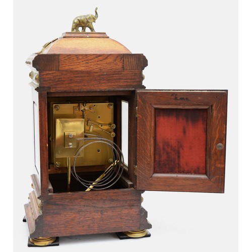 362 - Winterhalder and Hofmeier, a Victorian oak and brass mounted mantel clock, the chapter ring with Rom... 