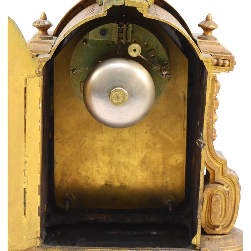 364 - A French late 19th century ormolu and porcelain mounted mantel clock, the front panel decorated with... 