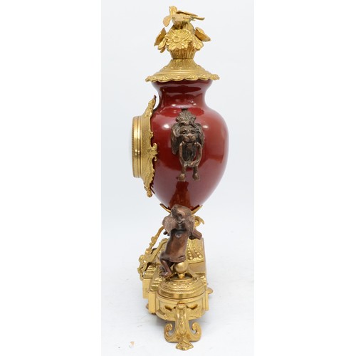 366 - Imperial, an Italian large gilt brass, bronzed and burgundy urn mantel clock, with love birds in a n... 