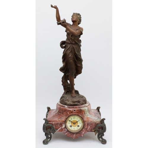 367 - A late 19th century French figural mantel clock, the dial set in a rose mottled marble body, raised ... 