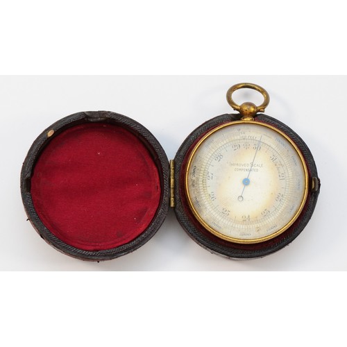 376 - A pocket aneroid barometer, Improved Scale, 4.5cms diameter, leather case