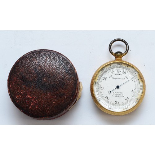 380 - A pocket aneroid barometer by A. Franks, Optician, Manchester, compensated for temperature, monogram... 