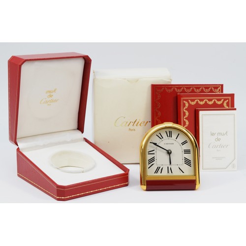 334 - Must de Cartier, a gold plated stirrup quartz desk alarm clock, c.1980's,  serial number 6602 1 U 06... 