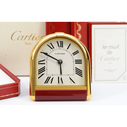 334 - Must de Cartier, a gold plated stirrup quartz desk alarm clock, c.1980's,  serial number 6602 1 U 06... 