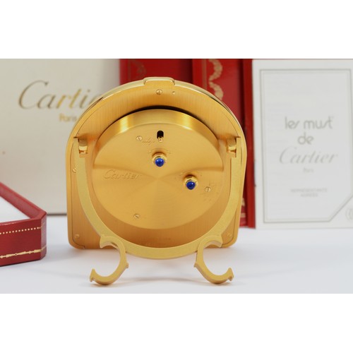 334 - Must de Cartier, a gold plated stirrup quartz desk alarm clock, c.1980's,  serial number 6602 1 U 06... 