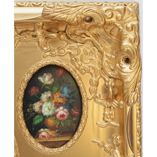 384 - A gilt wall mirror, with central oval bevelled panel surrounded by four oval painted floral still li... 