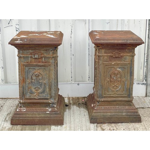 415 - A pair of cast iron garden urn stands, 46 x 82cm