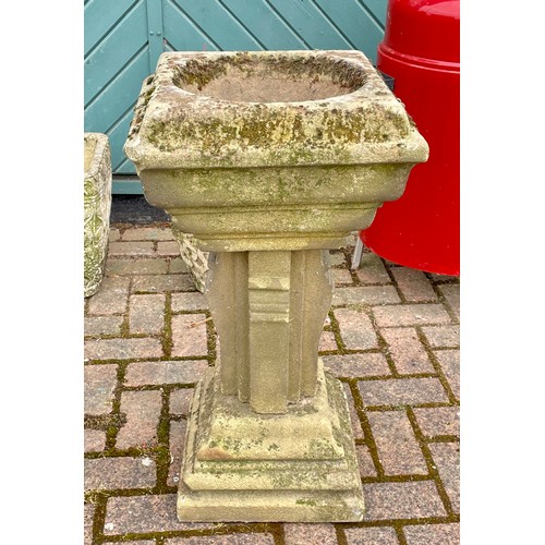 421 - A reconstituted stone square garden planter, raised on a stepped column, 73cm