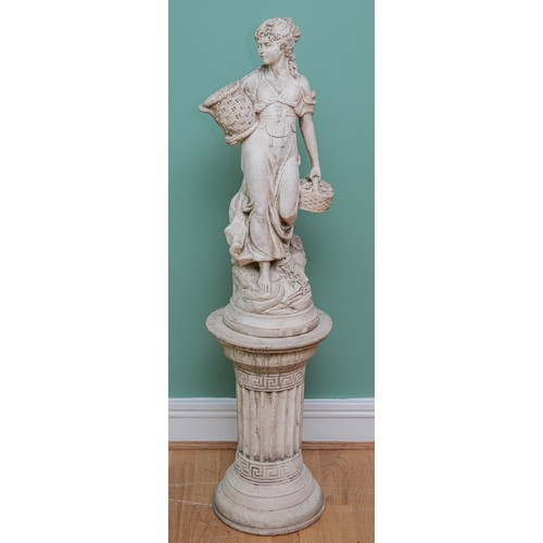 428 - A reconstituted stone statue of a lady carrying two baskets, raised on pedestal base, 120cm