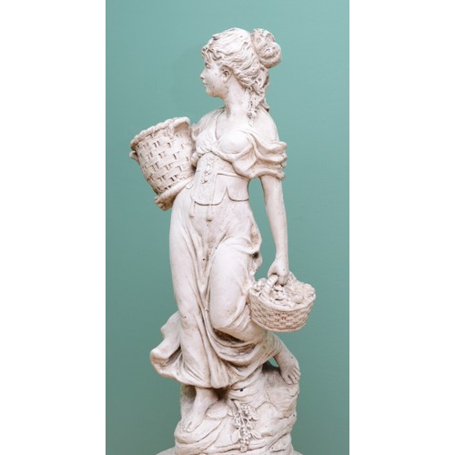 428 - A reconstituted stone statue of a lady carrying two baskets, raised on pedestal base, 120cm