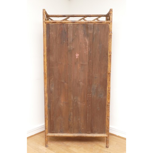 446 - An Edwardian bamboo cabinet, two glass doors over two cupboard doors, splayed legs, 92 x 190 x 35cm