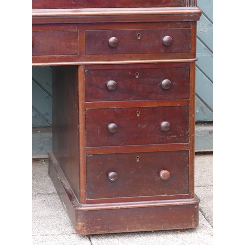 450 - A Victorian mahogany roll top desk, retailed by E. Miller & Co. Ltd., Leeds, with pull out slide rev... 