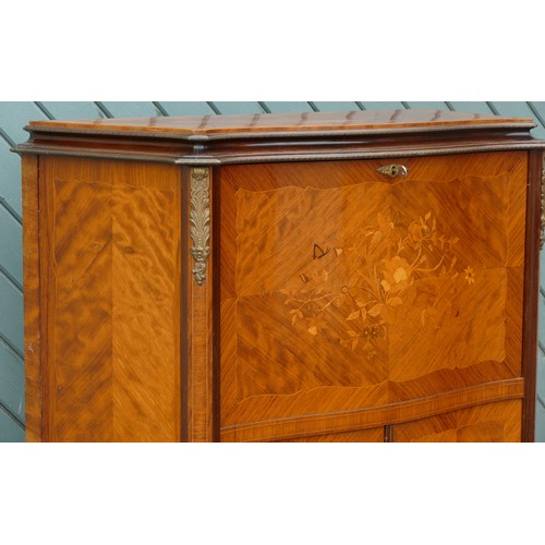 452 - A French mahogany, kingwood and boxwood inlaid drinks cabinet, the fall front with mirrored interior... 