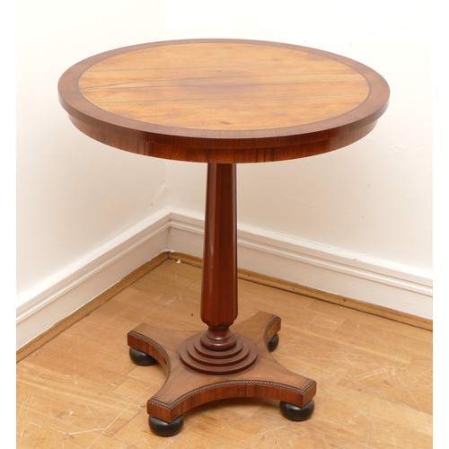 439 - A mahogany Victorian style circular side table, by Alfred Brett & Sons, Norwich, raised on a pedesta... 