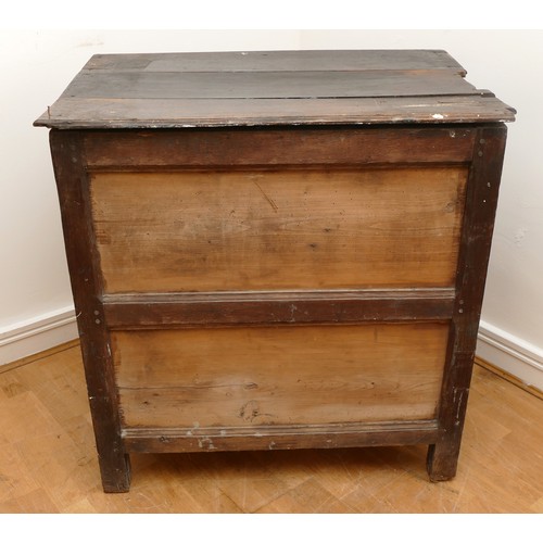 459 - A late 17th century oak chest of drawers, comprising four long graduated drawers (lacking top one) e... 