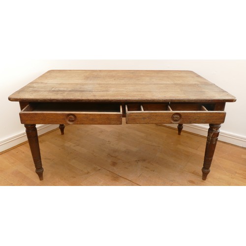 465 - A 19th century rectangular country kitchen table having five plank top with moulded frieze, two draw... 