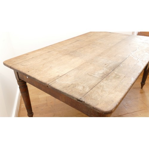 465 - A 19th century rectangular country kitchen table having five plank top with moulded frieze, two draw... 