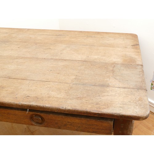 465 - A 19th century rectangular country kitchen table having five plank top with moulded frieze, two draw... 