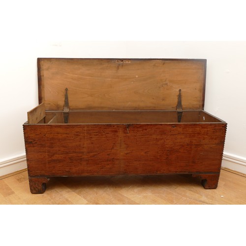 468 - An 18th century six plank chest of rectangular form, the hinged top opening to a fitted candle box, ... 