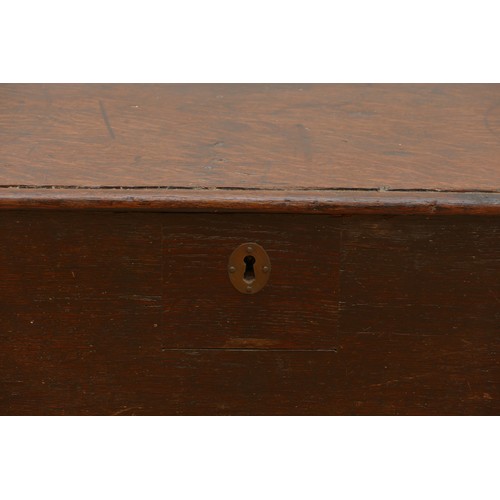 469 - An 18th century six plank chest, the rectangular hinged top having moulded frieze, raised on reduced... 