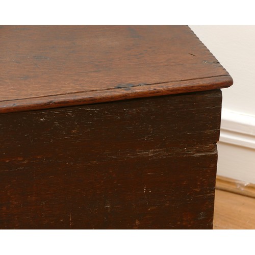 469 - An 18th century six plank chest, the rectangular hinged top having moulded frieze, raised on reduced... 