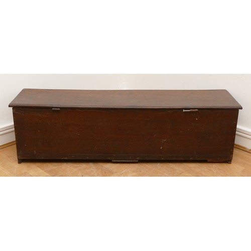 469 - An 18th century six plank chest, the rectangular hinged top having moulded frieze, raised on reduced... 