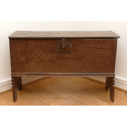 470 - An 18th century oak six plank chest or coffer, rectangular hinged top with carved rails, end boards ... 