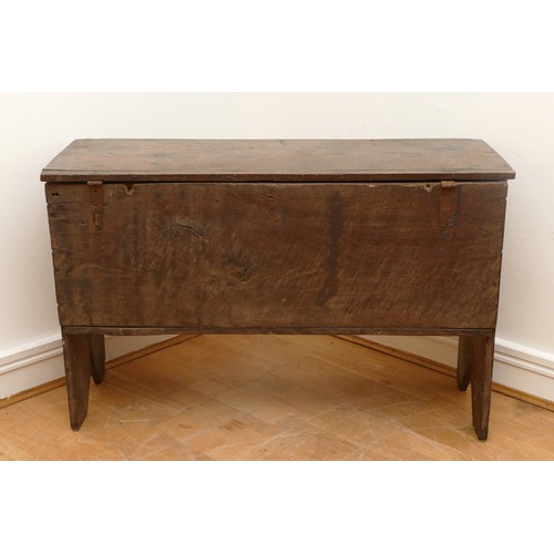 470 - An 18th century oak six plank chest or coffer, rectangular hinged top with carved rails, end boards ... 