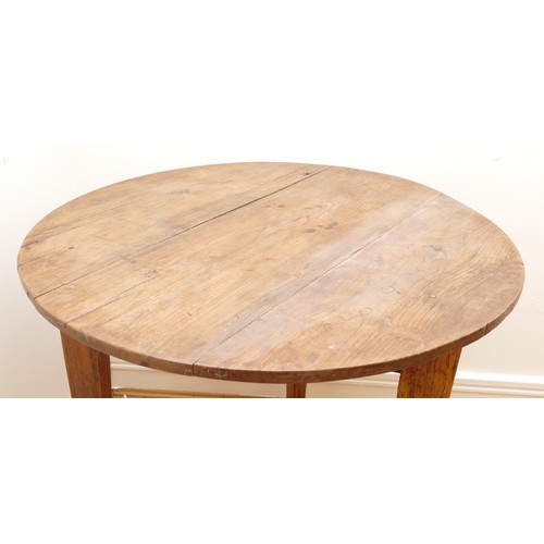 473 - A 19th Century pine cricket table, the circular top on three splayed and moulded square supports, 78... 