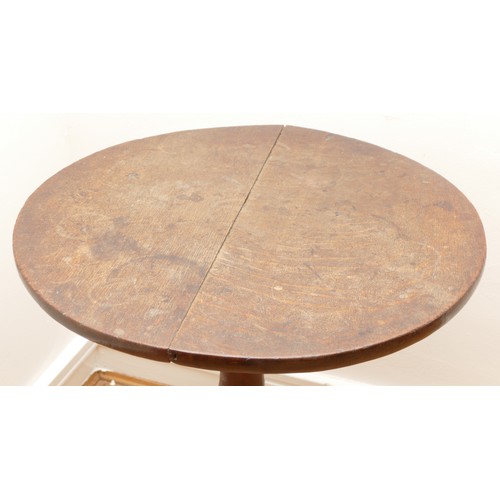 480 - A Victorian oak and mahogany tripod table, 56cm diameter.