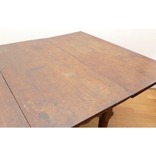 486 - A late 18th century mahogany gate leg dining table, rectangular drop-leaf top, raised on tapered sup... 