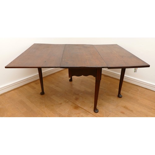 486 - A late 18th century mahogany gate leg dining table, rectangular drop-leaf top, raised on tapered sup... 