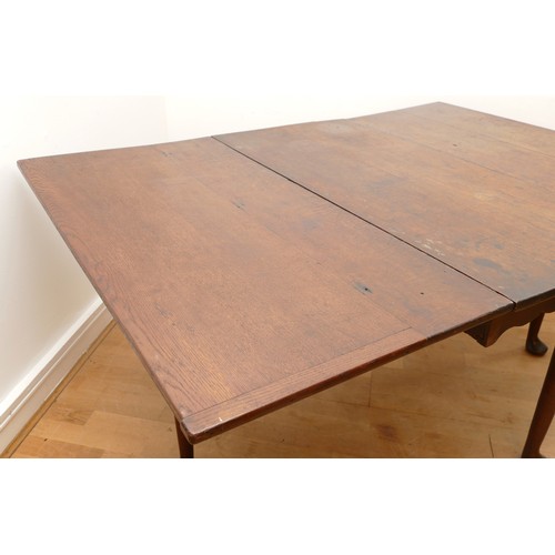 486 - A late 18th century mahogany gate leg dining table, rectangular drop-leaf top, raised on tapered sup... 