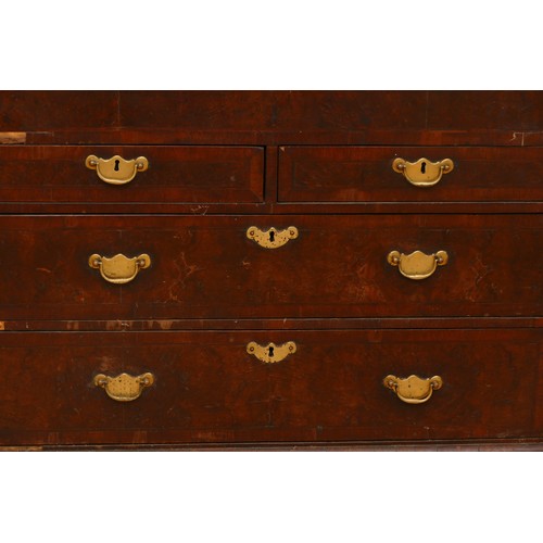 487 - A late 17th/early 18th century walnut bureau, veneered with cross banding, the overhanging slope wit... 