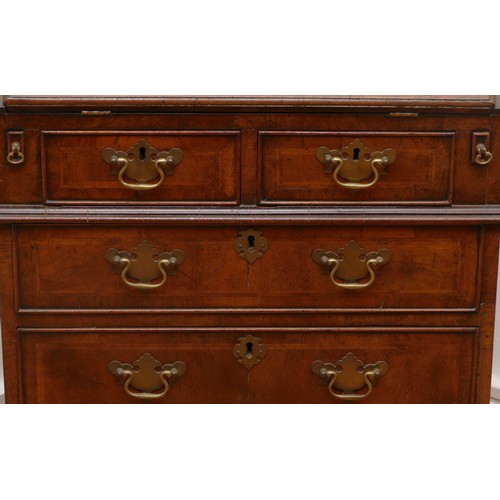 490 - A 19th century walnut bijou bureau, the drop leaf revealing fitted compartments, over two short and ... 