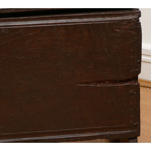 497 - A 17th century oak bible box, the hinged sloping top with carved lunette detail to the sides, W85, D... 