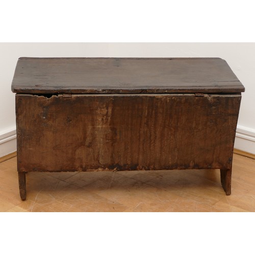 497 - A 17th century oak bible box, the hinged sloping top with carved lunette detail to the sides, W85, D... 