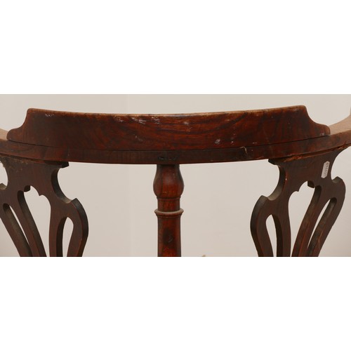 506 - A 19th century oak corner chair, with turned column upright supports, fret backrests and drop-in rus... 