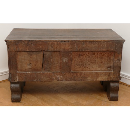 508 - A 19th century Spanish or Portuguese oak chest, the rectangular top with moulded edges over carved f... 