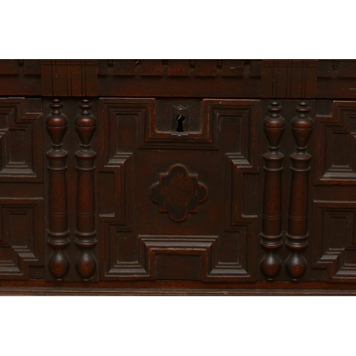 508 - A 19th century Spanish or Portuguese oak chest, the rectangular top with moulded edges over carved f... 