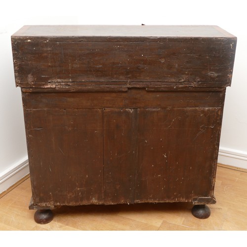 514 - A 17th century laburnum bureau, oyster veneered with walnut cross banding, the overhanging slope wit... 