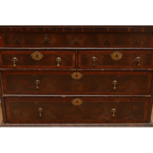 514 - A 17th century laburnum bureau, oyster veneered with walnut cross banding, the overhanging slope wit... 